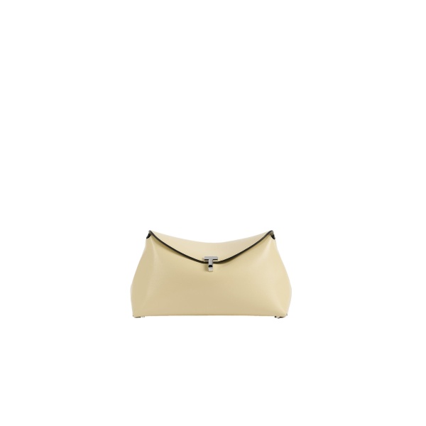 Toteme T-Lock leather clutch in Champagne