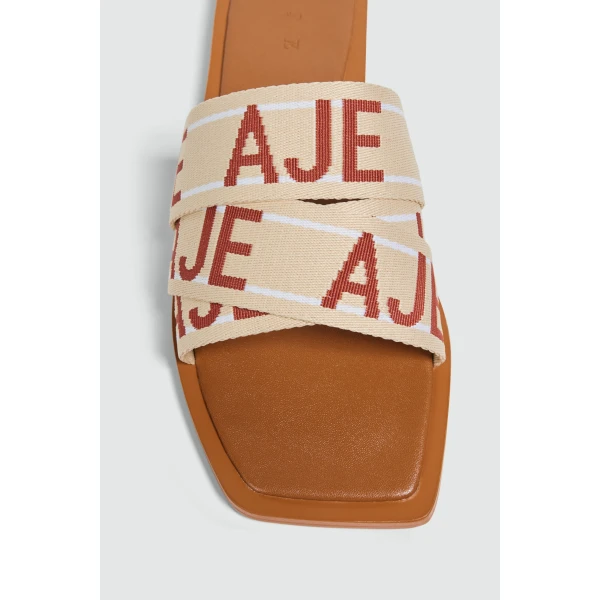 Aje Anais Slide in Chestnut/Natural | Flip Flops & Slides | Luxury Shoes 