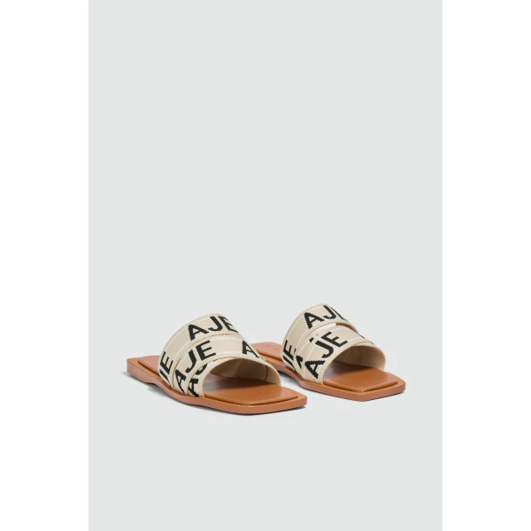 Aje Anais Slide in Tan/Natural | Flip Flops & Slides | Luxury Shoes 