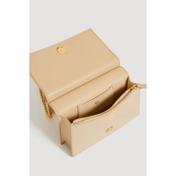 Aje Cece Clutch in Beach Beige | Clutch Bags | Luxury Shoes 