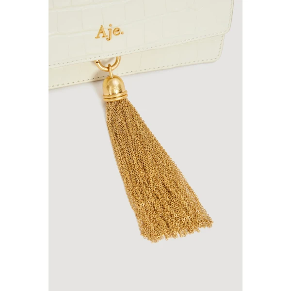 Aje Celia Croc Emboss Clutch in Ivory Croc | Clutch Bags | Luxury Shoes 