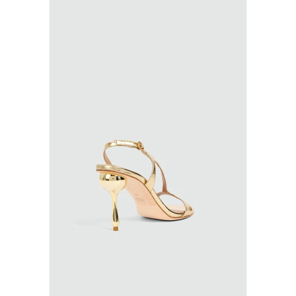 Aje Elan Asymmetric Droplet Heel in Gold | Heels | Luxury Shoes 