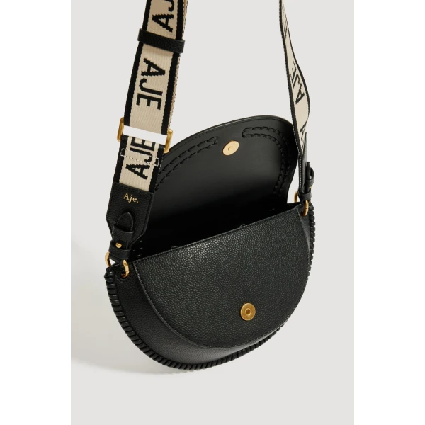 Aje Emery Medium Saddle Bag in Black | Shoulder & Crossbody Bags | Luxury Shoes 