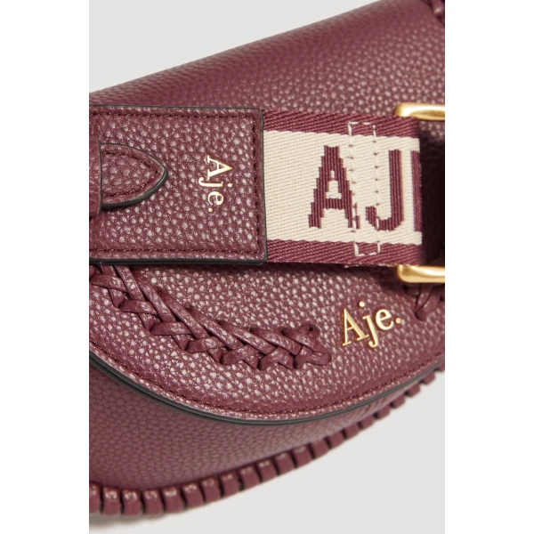 Aje Emery Small Saddle Bag in Mulberry | Shoulder & Crossbody Bags | Luxury Shoes 