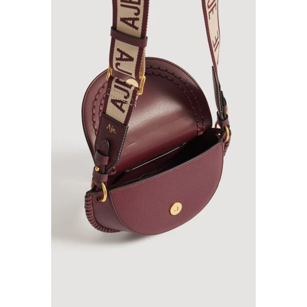 Aje Emery Small Saddle Bag in Mulberry | Shoulder & Crossbody Bags | Luxury Shoes 
