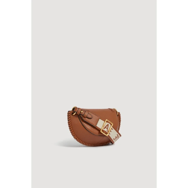 Aje Emery Small Saddle Bag in Spiced Chai | Shoulder & Crossbody Bags | Luxury Shoes 