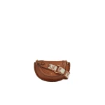 Aje Emery Small Saddle Bag in Spiced Chai | Shoulder & Crossbody Bags | Luxury Shoes 