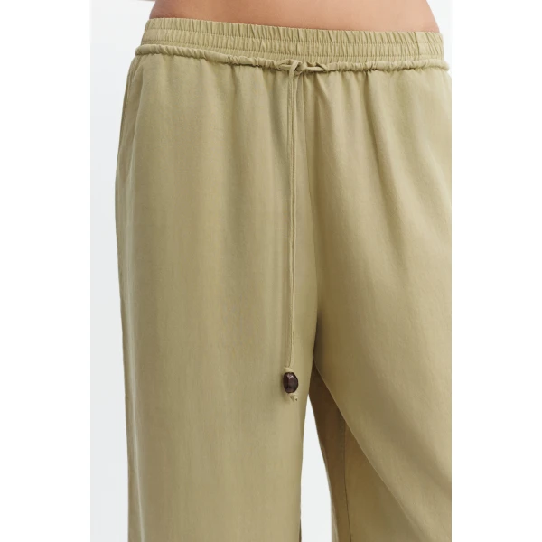 Aje Evie Relaxed Pant in Pale Olive | Pants | Luxury Shoes 