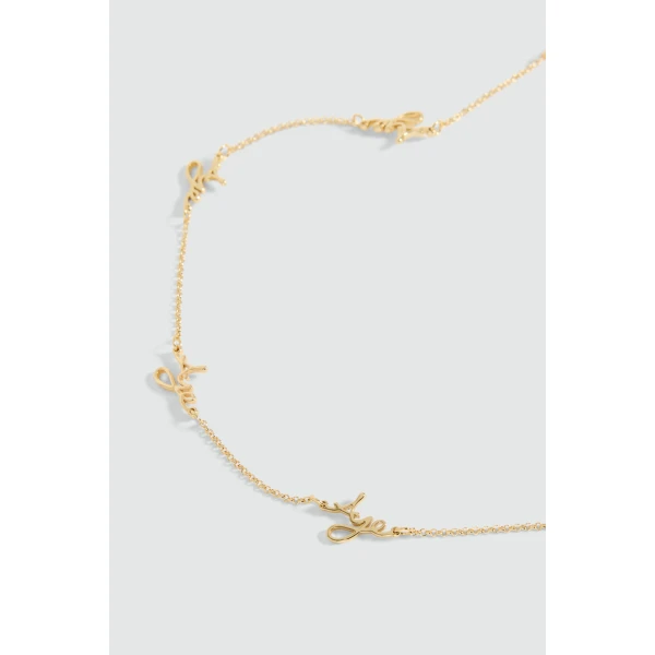 Aje Larissa Cursive Necklace in Gold | Necklace | Luxury Shoes 