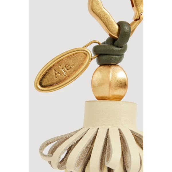 Aje Mini Belle Charm in Butter-Pink | Bag charms | Luxury Shoes 
