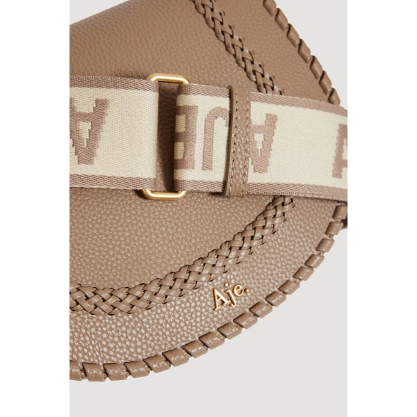 Aje Nina Logo Crossbody in Taupe | Shoulder & Crossbody Bags | Luxury Shoes 