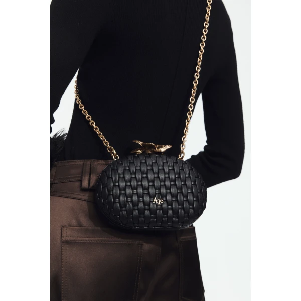 Aje Retrofete Woven Clutch in Black | Clutch Bags | Luxury Shoes 