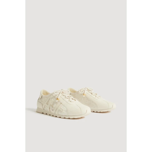 Aje Valli Lace Logo Trainer in Ivory Velvetine | Sneakers | Luxury Shoes 