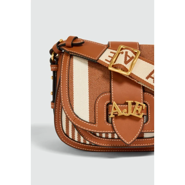 Aje Viva Small Canvas Saddle Bag in Spiced Chai/Natural | Shoulder & Crossbody Bags | Luxury Shoes 