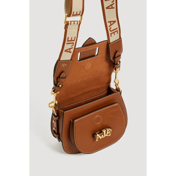 Aje Viva Small Saddle Bag in Spiced Chai | Shoulder & Crossbody Bags | Luxury Shoes 
