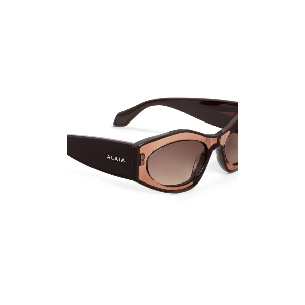 Alaia Cat Eye Sunglasses in Transparent Brown | Sunglasses | Luxury Shoes 