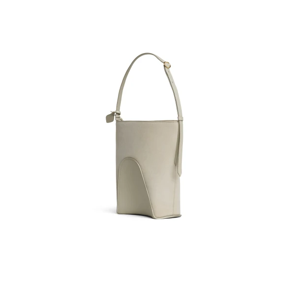 Alaia Hip Small Bucket Bi-Material Bag in Leather, Beige Grey | Bucket Bags | Luxury Shoes 
