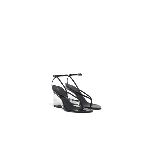 Alaia Invisible Thong Sandals in Patent Calfskin, Black | Sandals | Luxury Shoes 