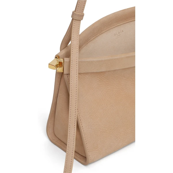 Alaia Le Click East West Medium Bag in Nubuck, Desert | Shoulder & Crossbody Bags | Luxury Shoes 