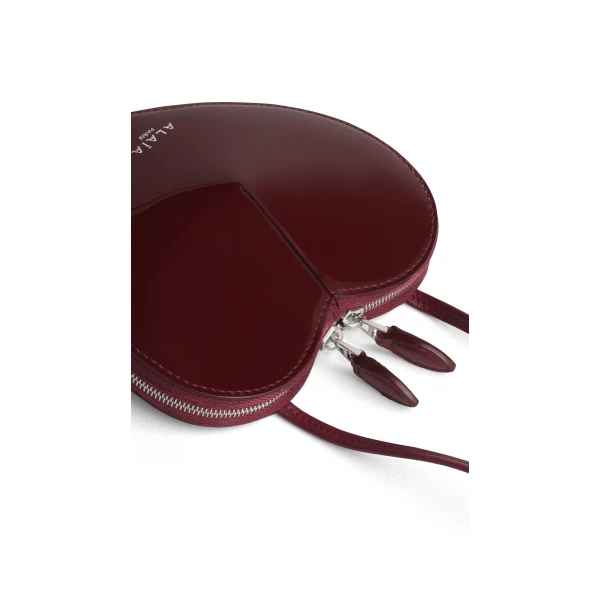 Alaia Le Coeur Small Bag in Patent Leather, Garnet Red | Mini Bags | Luxury Shoes 