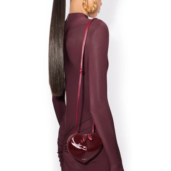 Alaia Le Coeur Small Bag in Patent Leather, Garnet Red | Mini Bags | Luxury Shoes 