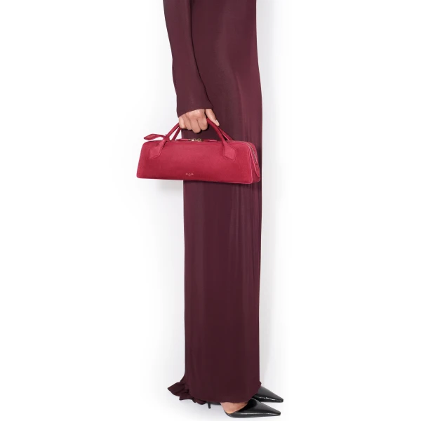 Alaia Le Teckel Clutch in Suede, Raspberry | Clutch Bags | Luxury Shoes 