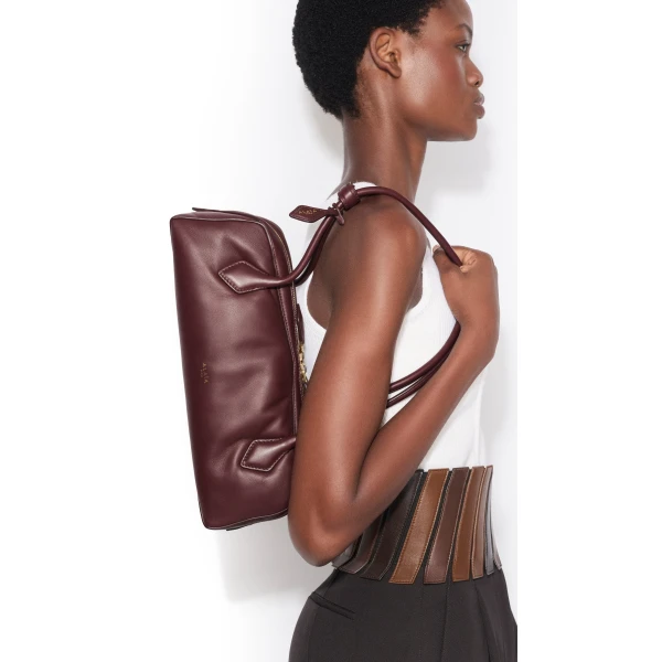 Alaia Le Teckel Medium Bag in Padded Leather, Garnet Red | Shoulder & Crossbody Bags | Luxury Shoes 