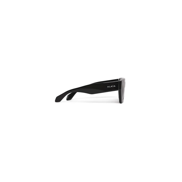 Alaia Melted Rectangular Sunglasses in Black and Grey | Sunglasses | Luxury Shoes 