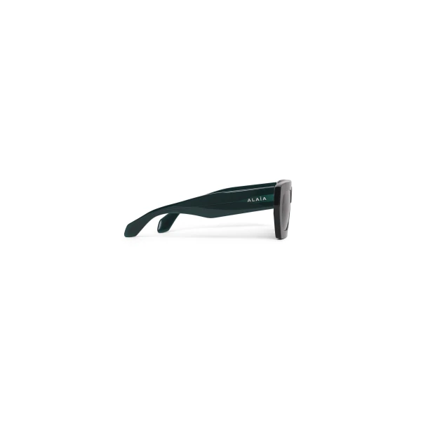 Alaia Melted Rectangular Sunglasses in Green | Sunglasses | Luxury Shoes 
