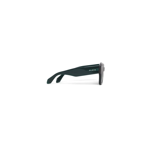 Alaia Melted Square Sunglasses in Green | Sunglasses | Luxury Shoes 