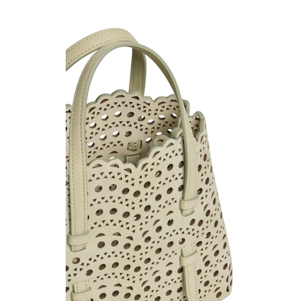 Alaia Mina 20 Bag in Perforated Vienne Nubuck, Almond Green | Mini Bags | Luxury Shoes 