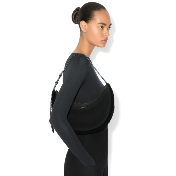 Alaia One Piece Demi Lune Bag in Merino Shearling, Black | Shoulder & Crossbody Bags | Luxury Shoes 