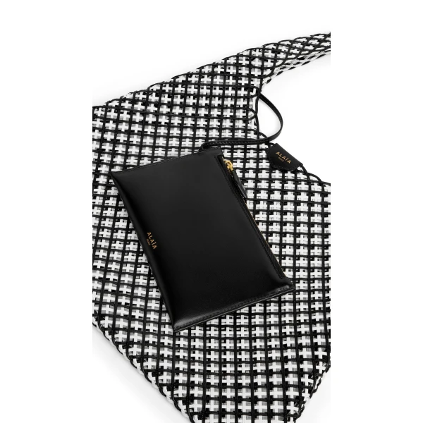 Alaia One Piece Hobo Bag in Leather Net, Black and White | Shoulder & Crossbody Bags | Luxury Shoes 