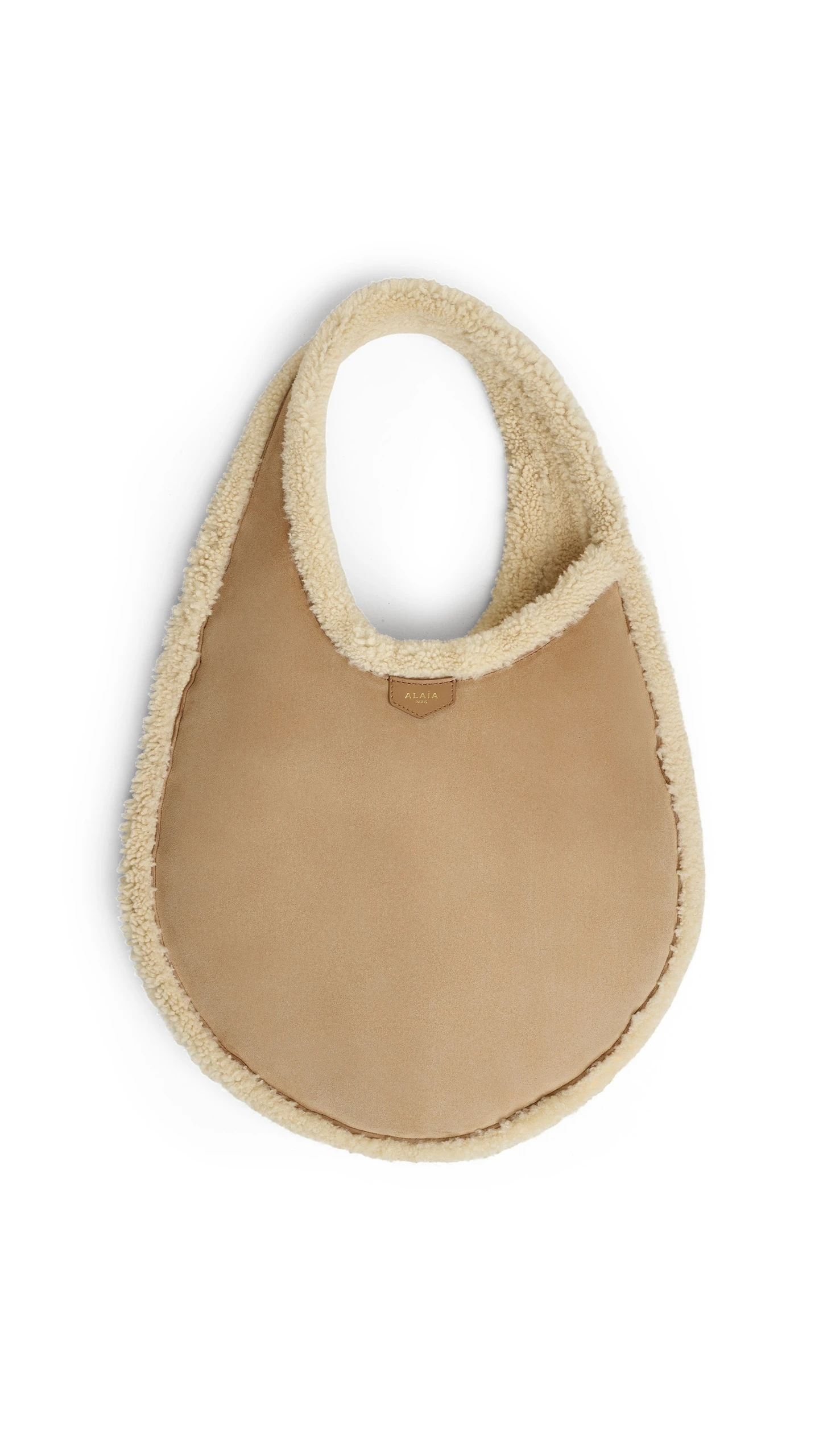 Alaia One Piece Hobo Bag in Merino Shearling, Camel Alaia One Piece Hobo Bag in Merino Shearling, Camel | Shoulder & Crossbody Bags | Luxury Shoes