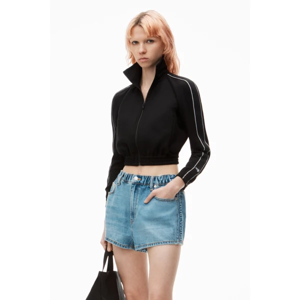 Alexander Wang Balloon Logo-Embossed Denim Marathon Short in Vintage Light Indigo | Denim Shorts | Luxury Shoes 