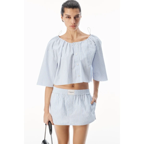 Alexander Wang Off-Shoulder Cropped Shirt with Bungee Drawcord in White and Blue | Shirts | Luxury Shoes 