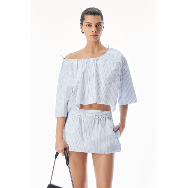 Alexander Wang Off-Shoulder Cropped Shirt with Bungee Drawcord in White and Blue | Shirts | Luxury Shoes 