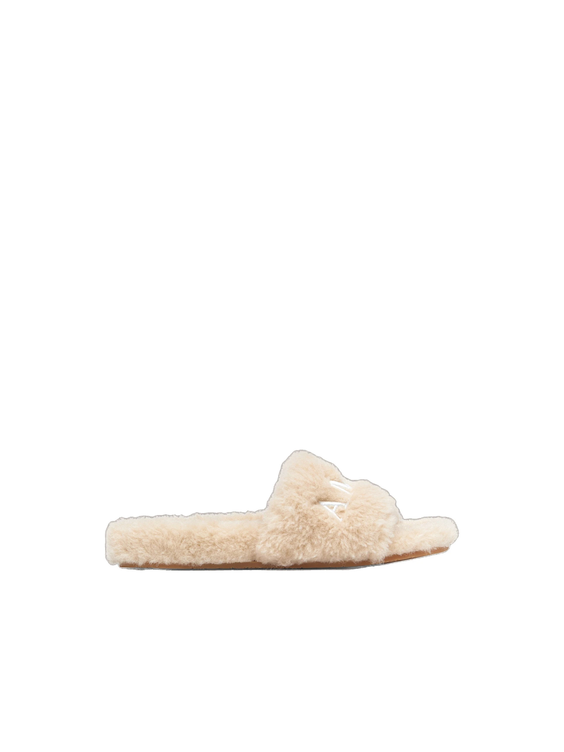 Amiri Shearling Slide in Natural Amiri Shearling Slide in Natural | Flip Flops & Slides | Luxury Shoes