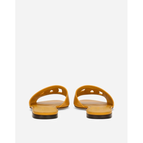 Yellow Dolce & Gabbana Calfskin slides with DG logo, view 4 | Flip Flops & Slides