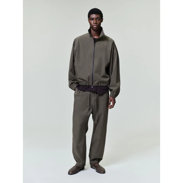 Fear of God Bonded Nylon Tech Track Pants in Forest | Pants | Luxury Shoes 