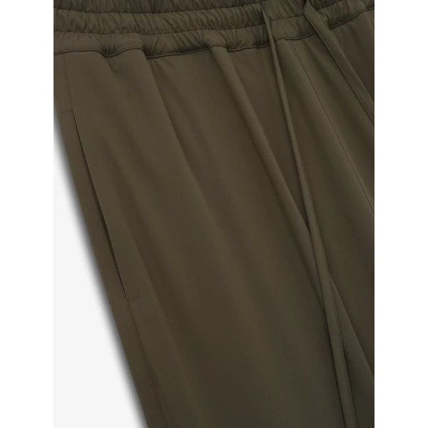 Fear of God Bonded Nylon Tech Track Pants in Forest | Pants | Luxury Shoes 