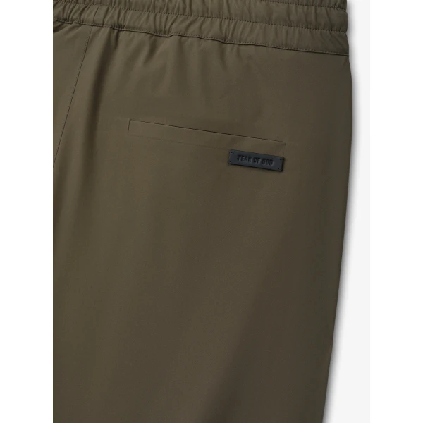 Fear of God Bonded Nylon Tech Track Pants in Forest | Pants | Luxury Shoes 