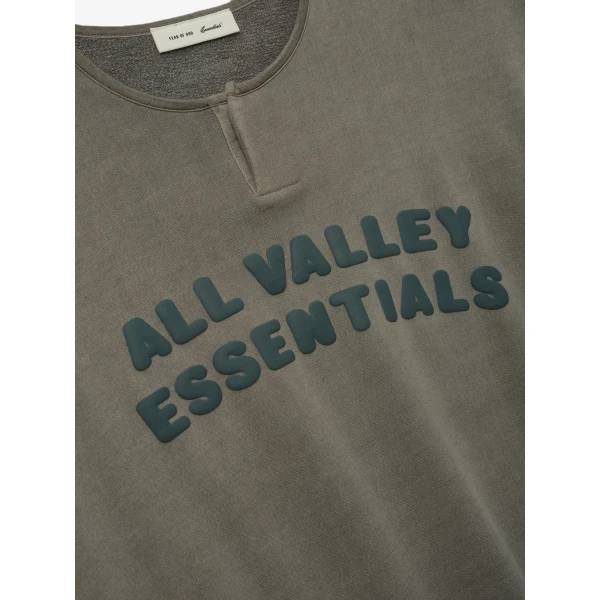 Fear of God Essentials 3/4 Henley Sweatshirt in Washed Seal | Sweatshirts | Luxury Shoes 