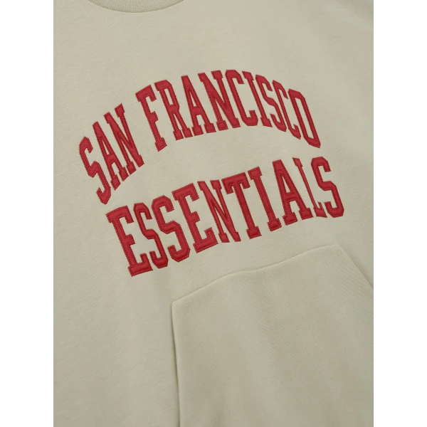 Fear of God Essentials 49ers 90s Relaxed Crewneck in Sandstone | Sweatshirts | Luxury Shoes 