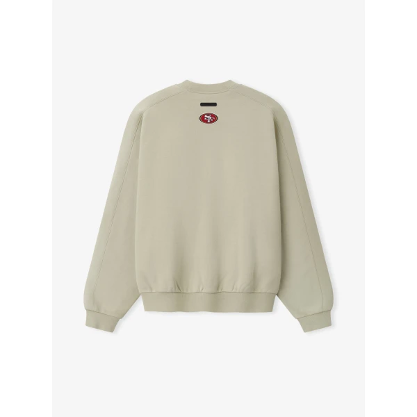 Fear of God Essentials 49ers 90s Relaxed Crewneck in Sandstone | Sweatshirts | Luxury Shoes 