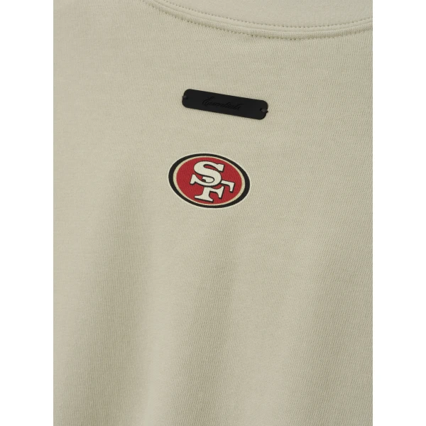Fear of God Essentials 49ers Merch Tee in Sandstone | T-shirts & vests | Luxury Shoes 