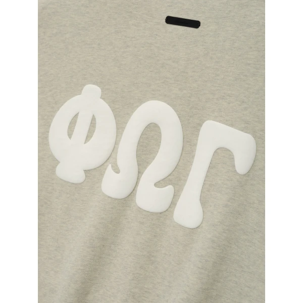 Fear of God Essentials 90s Sweatshirt in Washed Vanilla Heather | Sweatshirts | Luxury Shoes 