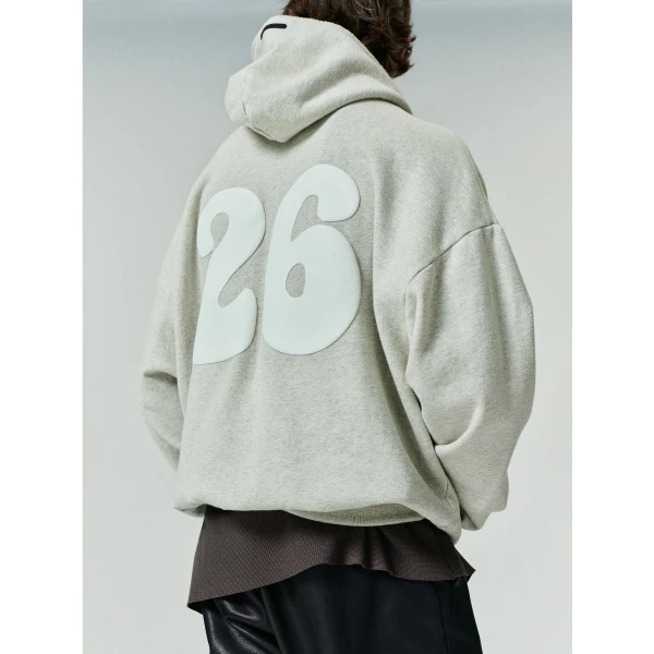 Fear of God Essentials 90s Zip-Up Hoodie in Washed Vanilla Heather | Sweatshirts | Luxury Shoes 
