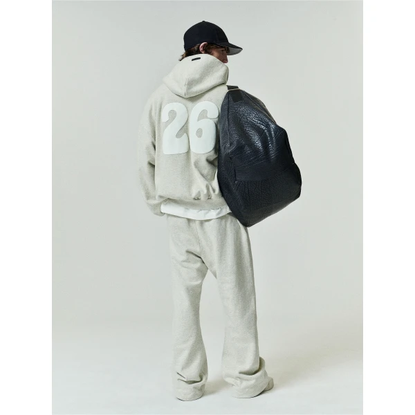 Fear of God Essentials 90s Zip-Up Hoodie in Washed Vanilla Heather | Sweatshirts | Luxury Shoes 