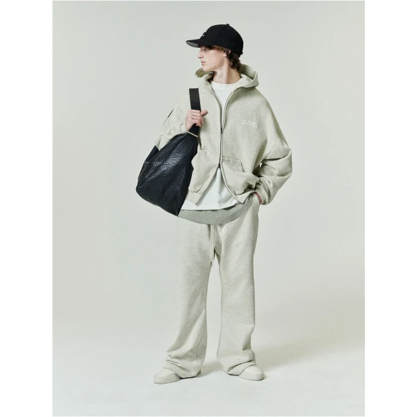 Fear of God Essentials 90s Zip-Up Hoodie in Washed Vanilla Heather | Sweatshirts | Luxury Shoes 